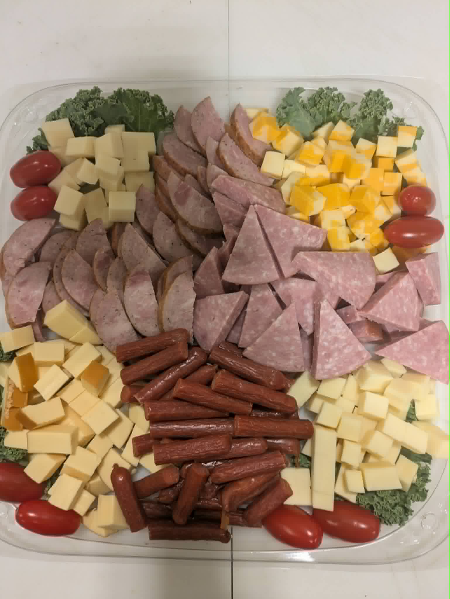 platter consisting meats and cheese